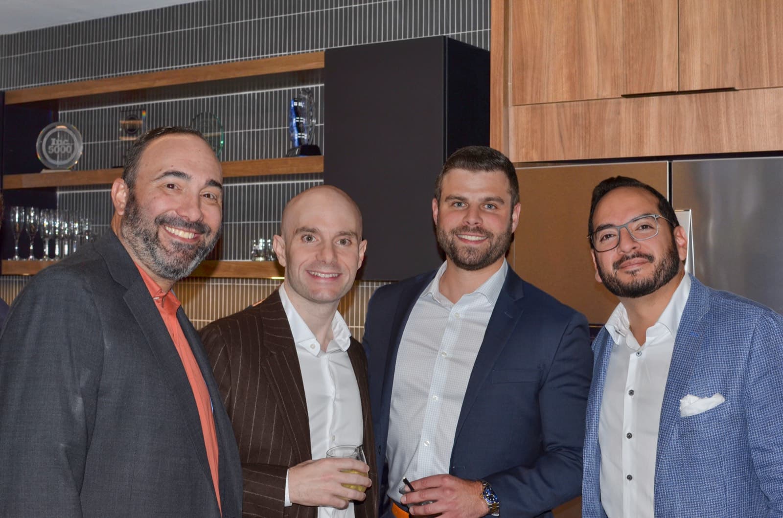The Leviate crew together at an evening event